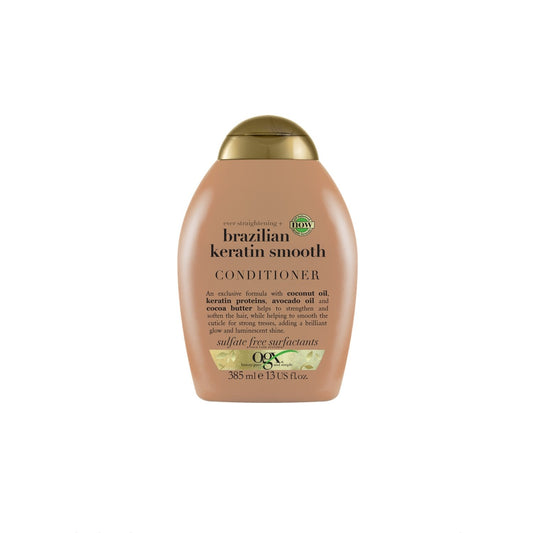 Après-Shampoing Lissant Cheveux Bouclés et Ondulés Huile de Coco Protéines de Kératine Huile d'Avocat et Beurre de Cacao OGX le flacon de 385 ml